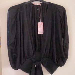 NWT.  Ladies sheer black shimmer topper blouse.
